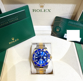 Rolex Submariner 126613LB in box with official warranty card and papers